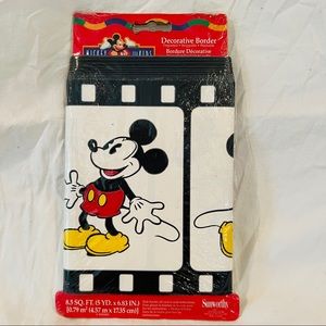 Sunworthy decorative border.  Mickey Mouse on film